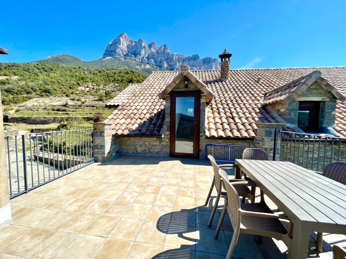 Apartamentos Bajo Pena Apartamentos Sanlorien El Pueyo de Araguás Esterno foto